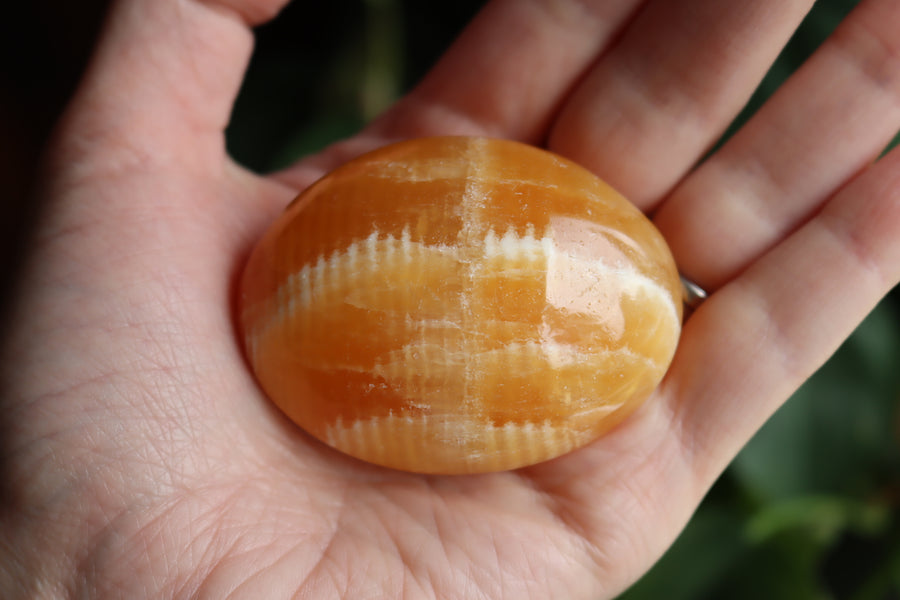 Orange calcite pocket stone 12 new