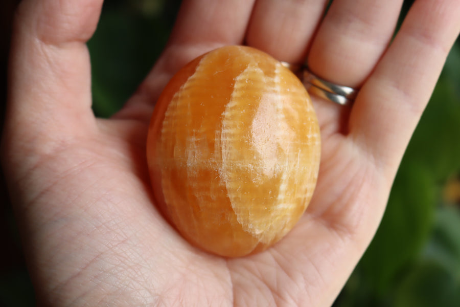 Orange calcite pocket stone 15 new