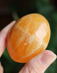 Orange calcite pocket stone 15 new